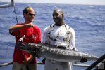 Happy anglers with wahoo