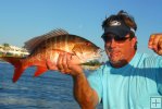 Angler with mutton snapper