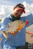Ron Klys with piranha