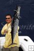 Holding a wahoo high