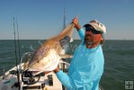 Captain Curtiss Cash and bull redfish