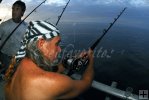 Fisherman waits for bite on Gulf partyboat