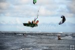 Kite surfer riding high