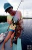 Lady angler with cubera snapper