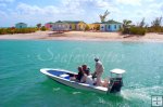Bonefish skiff with anglers