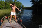 Huntress fires at fish