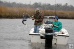 Landing a redfish in winter