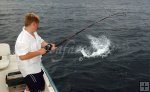 Young angler fights kingfish