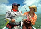 Happy angler and guide
