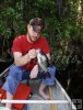 Catching fish from a canoe