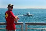 Fisherman with Marine Patrol nearby
