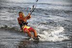 Kite surfing at sunset